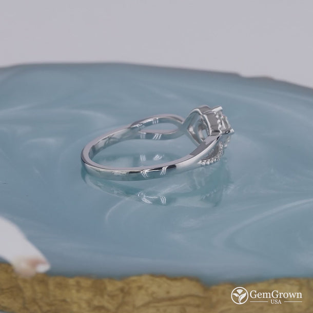 Round Cut Moissanite Crossover Solitaire Engagement Ring